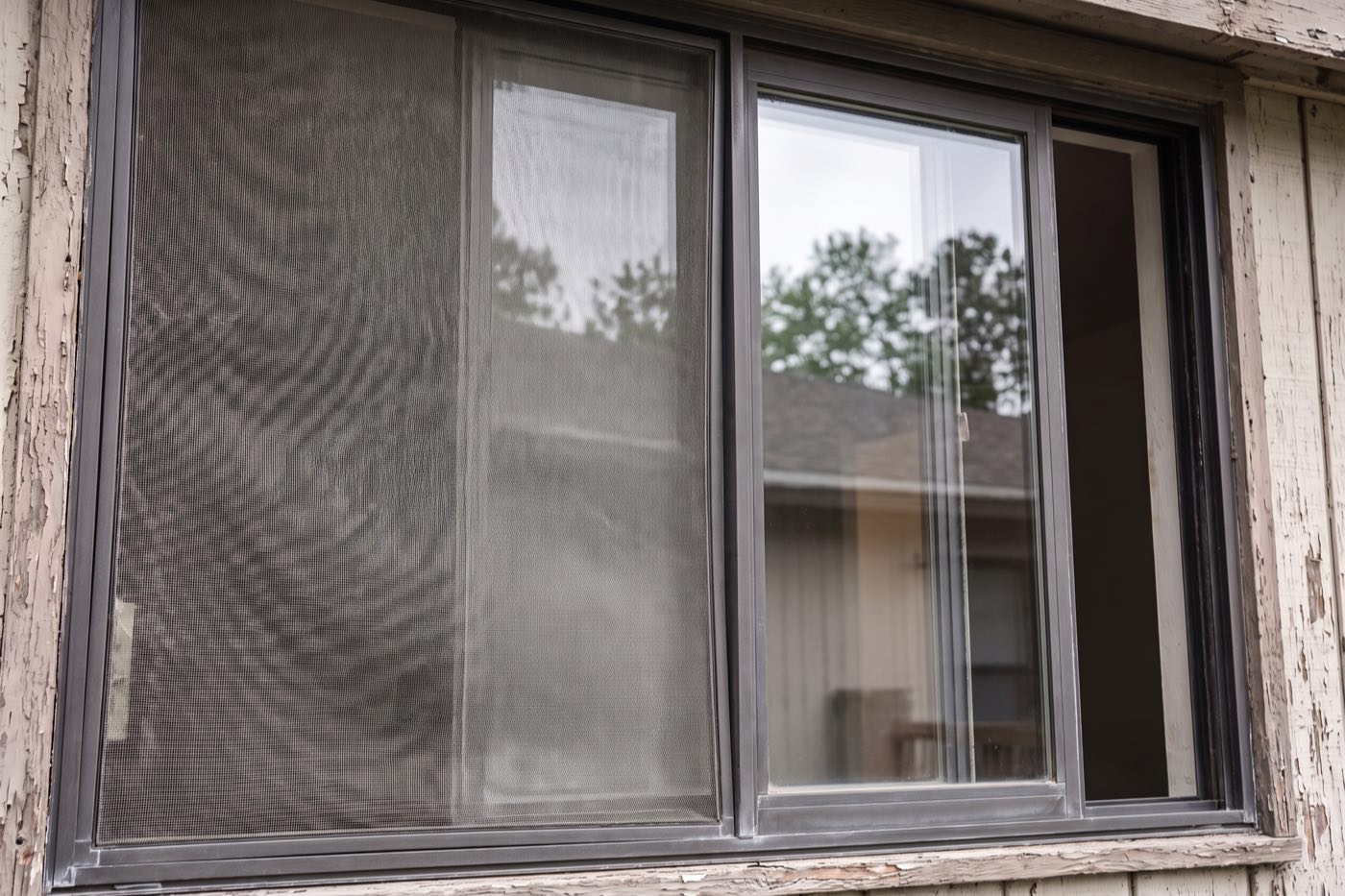 The same window with clear glass and a clean frame and screen.